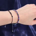 Kristallkerze Schütze – Sternzeichenkerze mit Edelsteinarmband